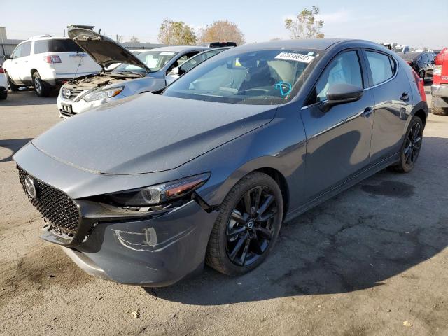 Salvage cars for sale from Copart Bakersfield, CA: 2022 Mazda 3 Premium
