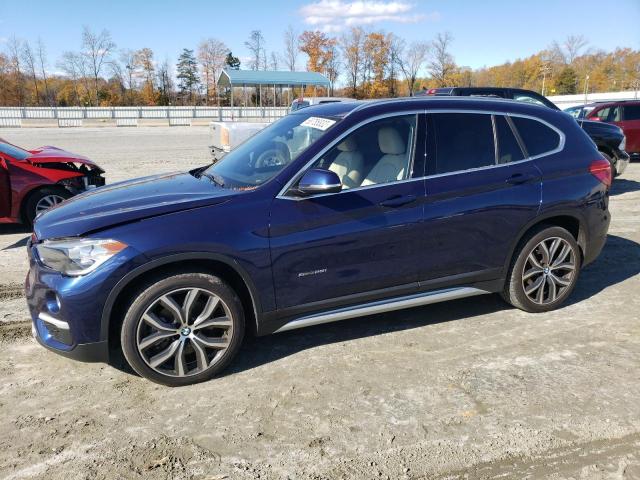 VIN WBXHU7C32J5H43050 2018 BMW X1 no.1