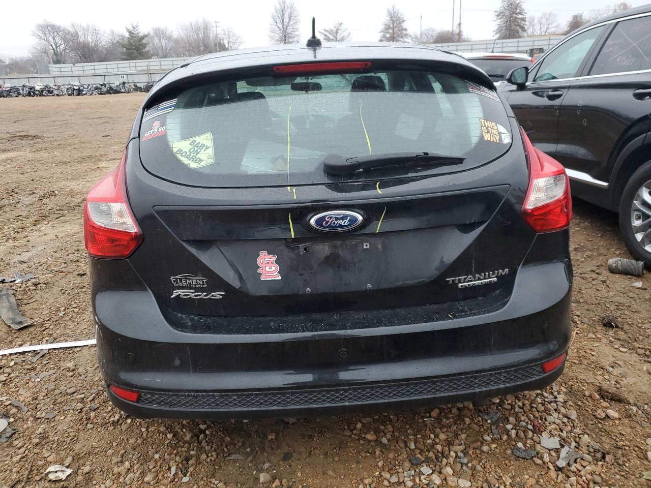 2014 Ford Focus Titanium VIN: 1FADP3N23EL460810 Lot: 70433952