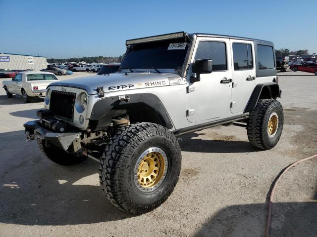 Salvage cars for sale at Houston, TX auction: 2011 Jeep Wrangler Unlimited Sport