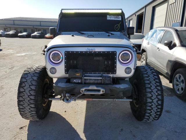 1J4BA3H15BL512630 | 2011 Jeep wrangler unlimited sport