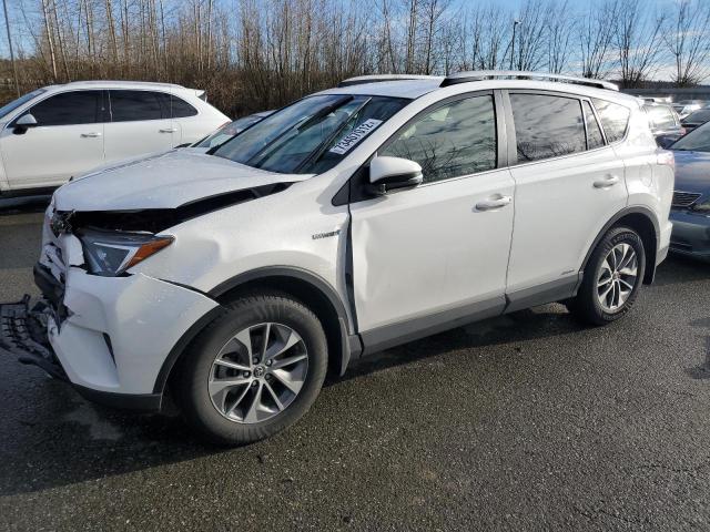 Salvage cars for sale from Copart Arlington, WA: 2018 Toyota Rav4 HV LE