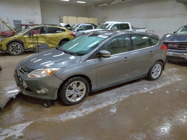 Salvage cars for sale from Copart Davison, MI: 2012 Ford Focus SEL