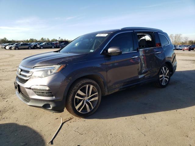 2017 HONDA PILOT TOUR - 5FNYF5H93HB041611