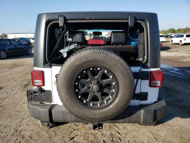 1C4AJWAG0FL523011 Jeep Wrangler Sport