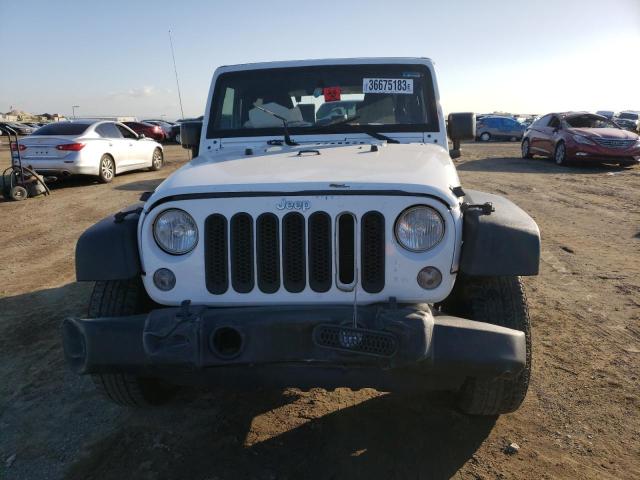 1C4AJWAG0FL523011 Jeep Wrangler Sport