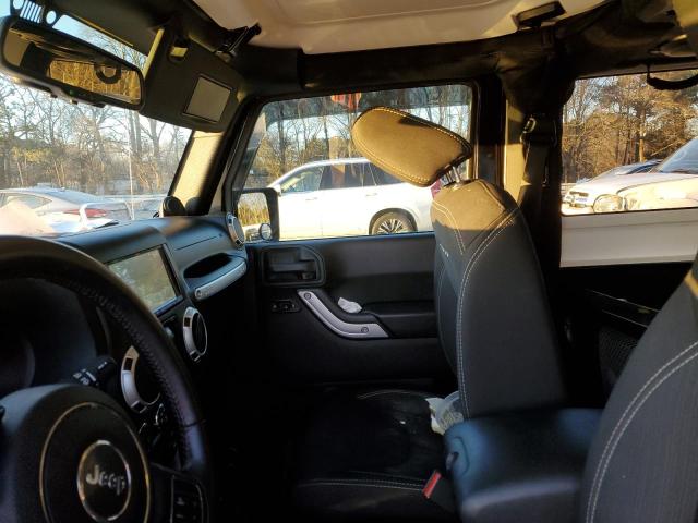 1C4AJWBG8EL308800 Jeep Wrangler Sahara