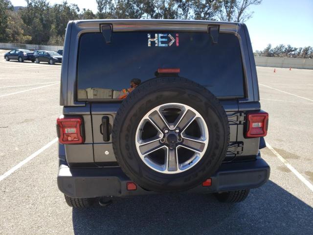 1C4HJXENXJW246114 Jeep Wrangler Unlimited Sahara