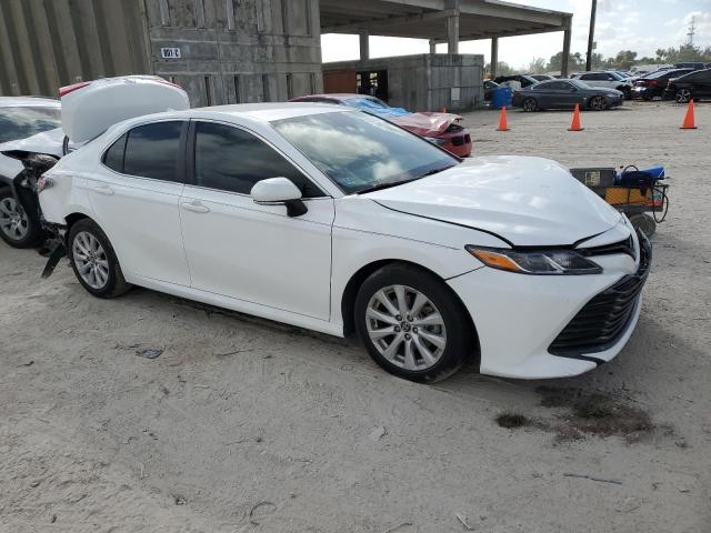 VIN 5J6RM4H94GL117069 2019 TOYOTA CAMRY no.4