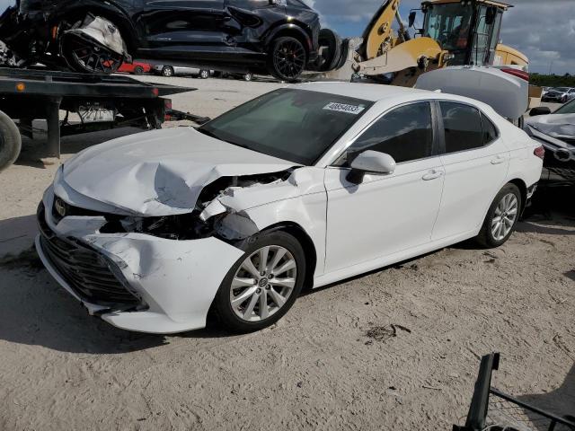 VIN 5J6RM4H94GL117069 2019 TOYOTA CAMRY no.1