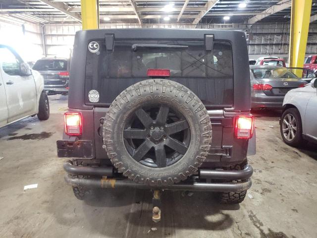 1C4HJWDG9EL221354 Jeep Wrangler Unlimited Sport