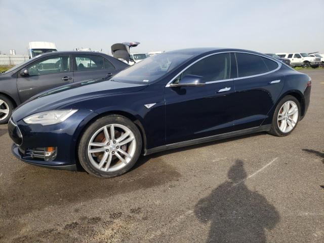Carros dañados por inundaciones a la venta en subasta: 2014 Tesla Model S