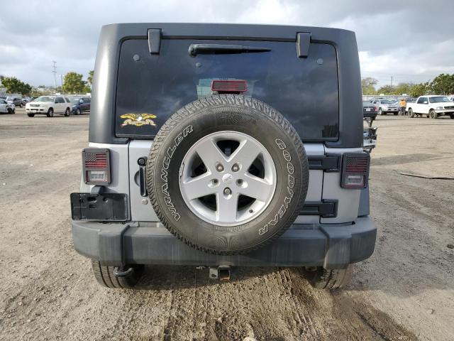 1C4HJWDG7EL208957 Jeep Wrangler Unlimited Sport