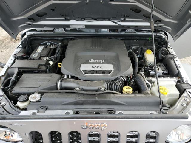 1C4HJWDG7EL208957 Jeep Wrangler Unlimited Sport