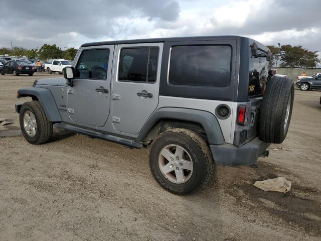 1C4HJWDG7EL208957 Jeep Wrangler Unlimited Sport
