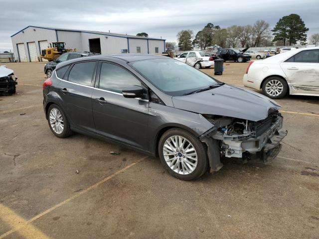 2015 FORD FOCUS TITA 1FADP3N20FL328279