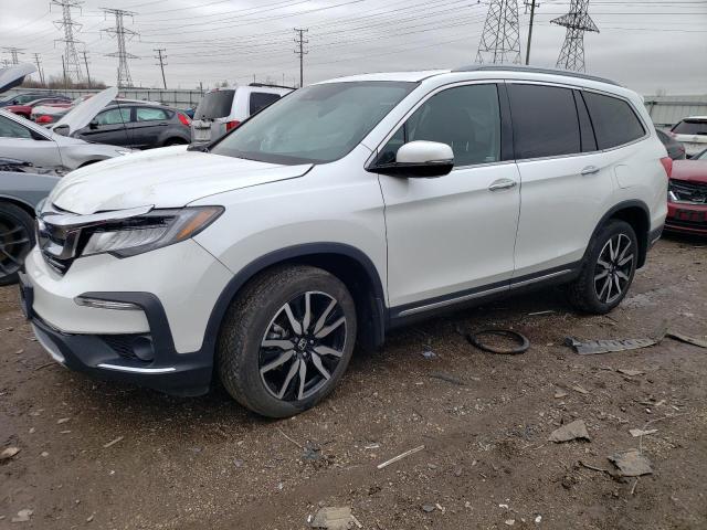2021 HONDA PILOT TOUR - 5FNYF6H93MB064094