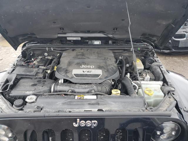 1C4BJWEG0EL264811 Jeep Wrangler Unlimited Sahara