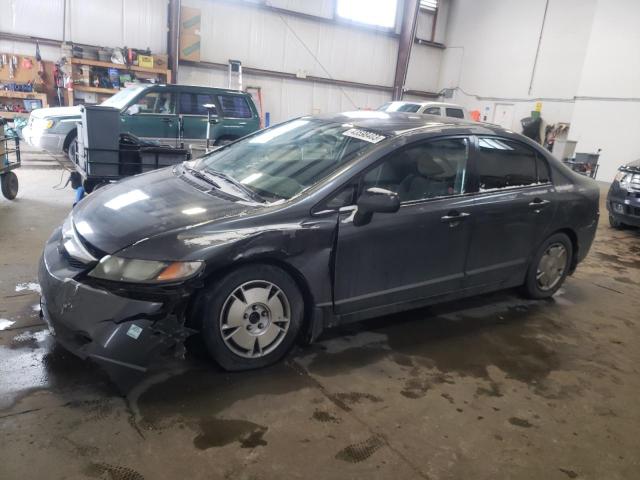 Salvage cars for sale from Copart Nisku, AB: 2010 Honda Civic DX-G