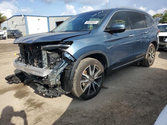 2021 HONDA PILOT TOUR - 5FNYF5H61MB035404