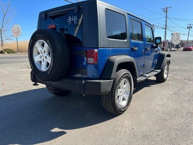 1J4BA3H12AL147032 Jeep Wrangler Unlimited Sport