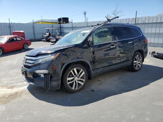 2016 HONDA PILOT TOUR - 5FNYF6H99GB104196