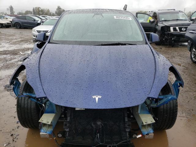7SAYGAEE0NF493831 Tesla Model Y