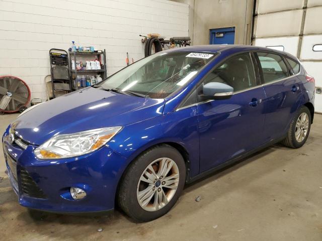 Salvage cars for sale from Copart Blaine, MN: 2012 Ford Focus SEL