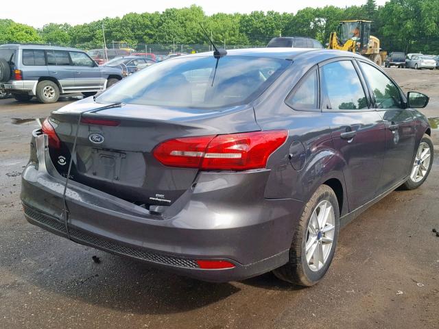 VIN WBA3B1C54FK135934 2015 FORD FOCUS SE no.4