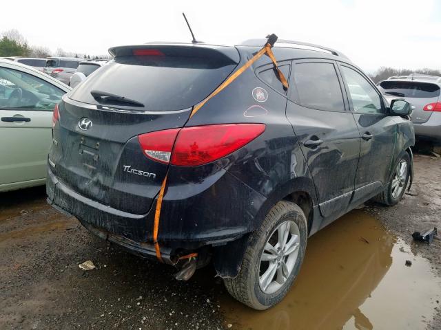 hyundai tucson 2010 vin km8ju3acxau098365