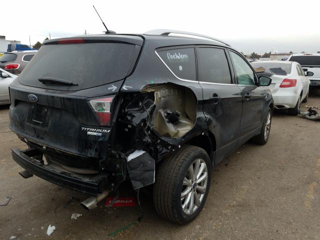 2017 FORD ESCAPE TIT 1FMCU9J90HUC20029