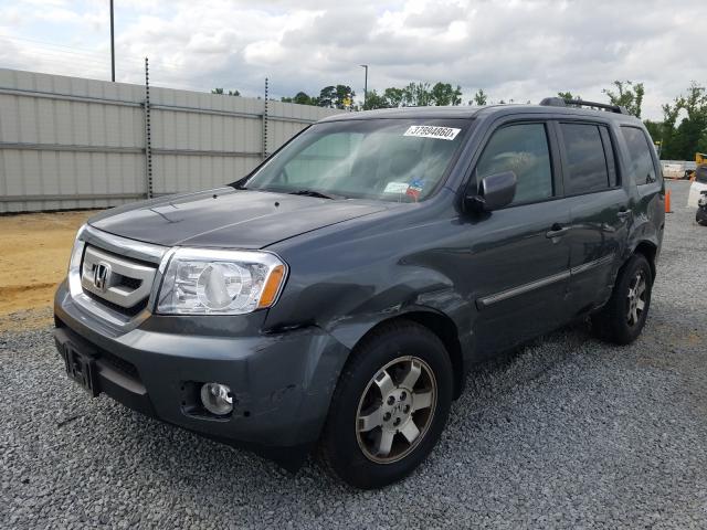 2011 HONDA PILOT TOUR 5FNYF4H90BB070226