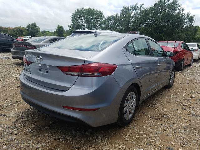 VIN 4T1B11HK8KU711521 2019 Toyota Camry, LE no.4