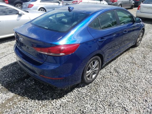 VIN 3FA6P0LU4DR283048 2013 Ford Fusion, Hybrid SE no.4