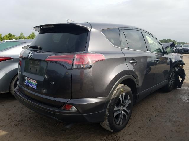 VIN 5UXXW3C58J0T82915 2018 TOYOTA RAV4 LE no.4