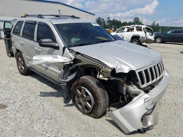 VIN 2T3F1RFV3MW235699 2009 JEEP GRAND CHEROKEE no.1