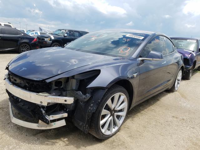 tesla model 3 2018 vin 5yj3e1ea3jf031090