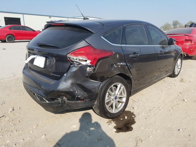 2015 FORD FOCUS TITA 1FADP3N20FL361640