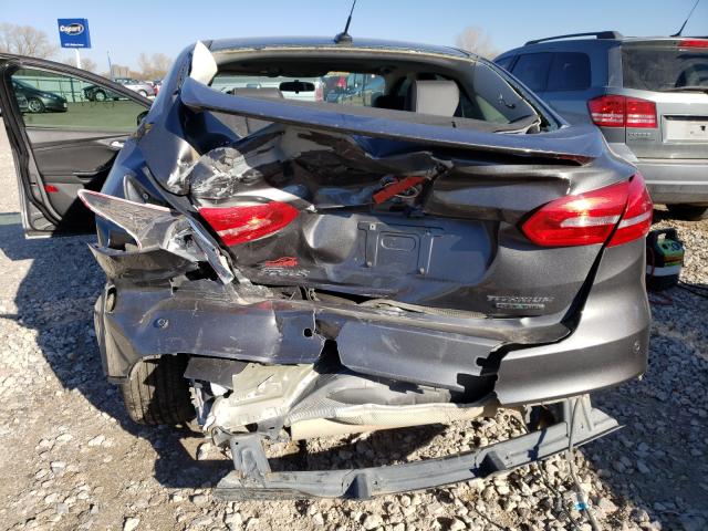 2015 FORD FOCUS TITA 1FADP3J25FL305683