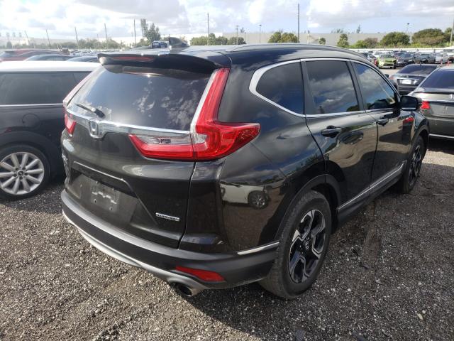 2019 HONDA CR-V TOURI 7FARW1H95KE003662