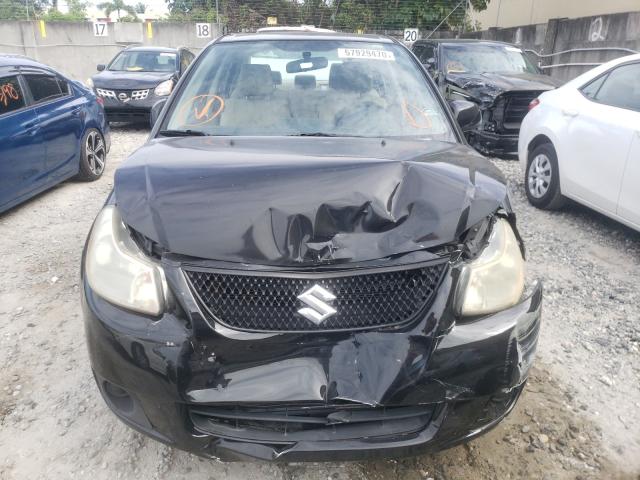 2011 SUZUKI SX4 LE JS2YC5A21B6304581