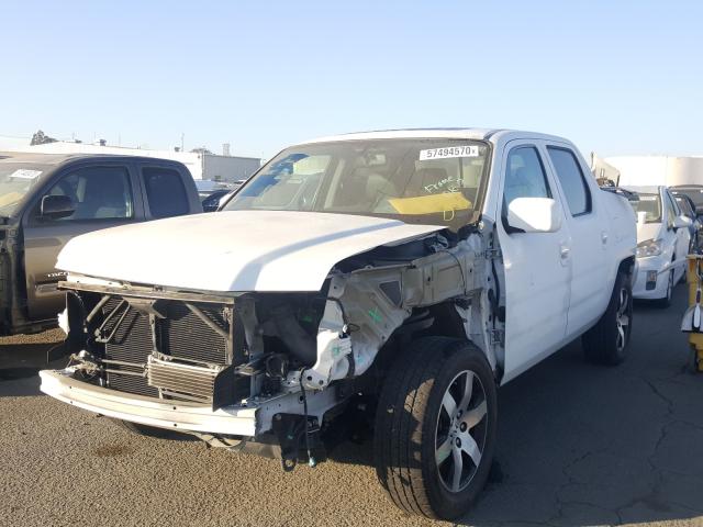 2014 HONDA RIDGELINE 5FPYK1F60EB007495