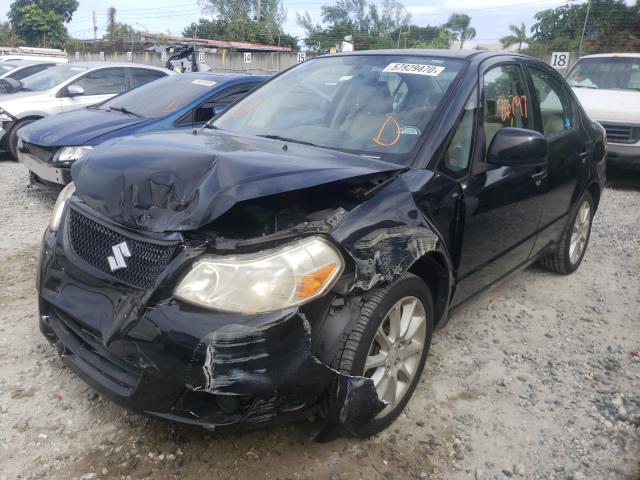 2011 SUZUKI SX4 LE JS2YC5A21B6304581