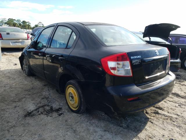 2011 SUZUKI SX4 LE JS2YC5A26B6300042