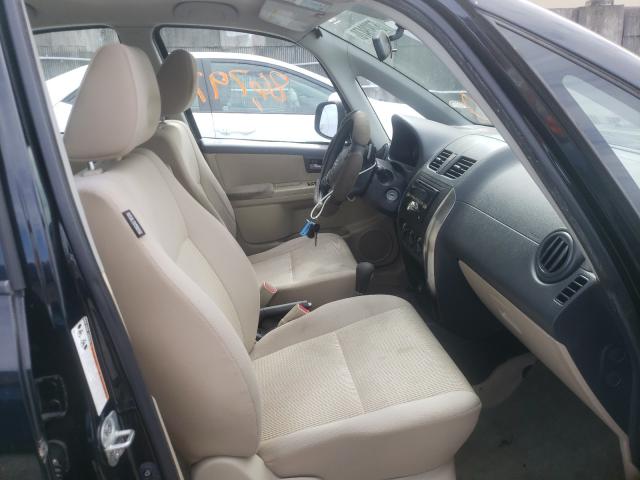 2011 SUZUKI SX4 LE JS2YC5A21B6304581