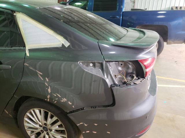 2015 FORD FOCUS TITA 1FADP3J22FL374394