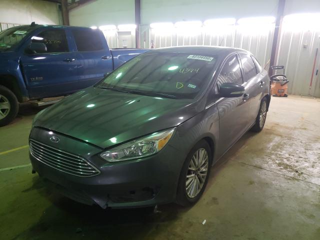 2015 FORD FOCUS TITA 1FADP3J22FL374394