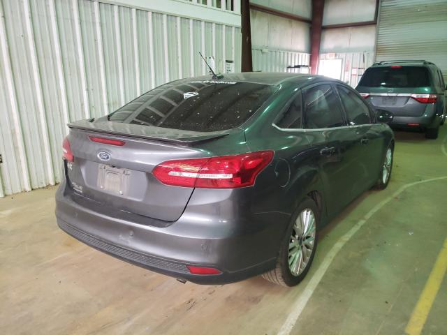 2015 FORD FOCUS TITA 1FADP3J22FL374394