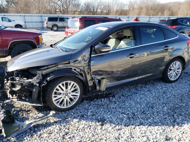 2015 FORD FOCUS TITA 1FADP3J24FL286009