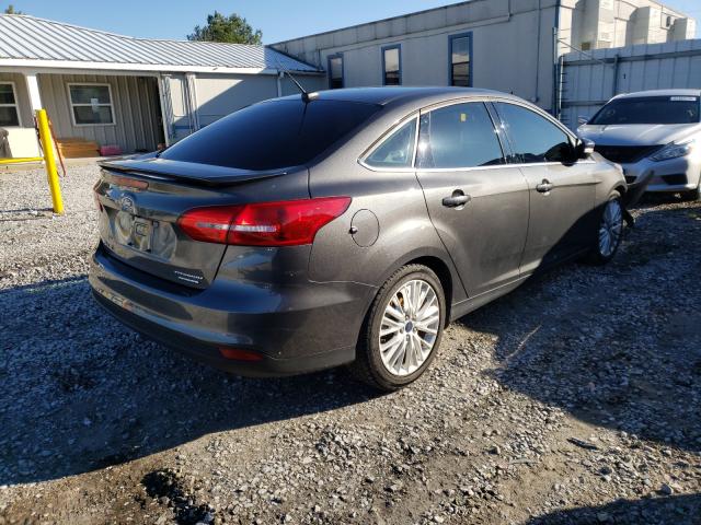 2015 FORD FOCUS TITA 1FADP3J24FL286009